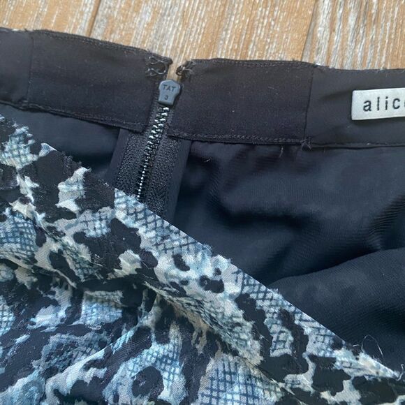 Alice + Olivia
Athena Python-Print Stretch Silk A-Line Midi Skirt - Picture 8 of 9